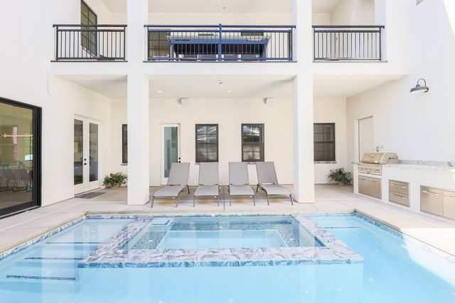 Private pool, spa, loungers and outdoor kitchen in courtyard