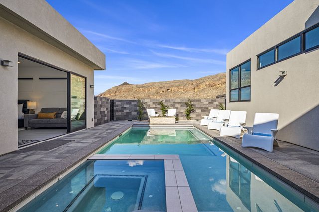 Private spa and pool with lounge chairs at Copper Rock 3557