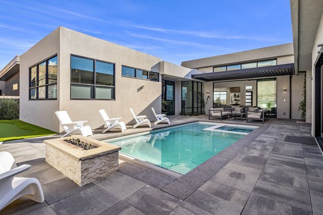 Private pool with fire pit and Adirondack chairs at Copper Rock 3557