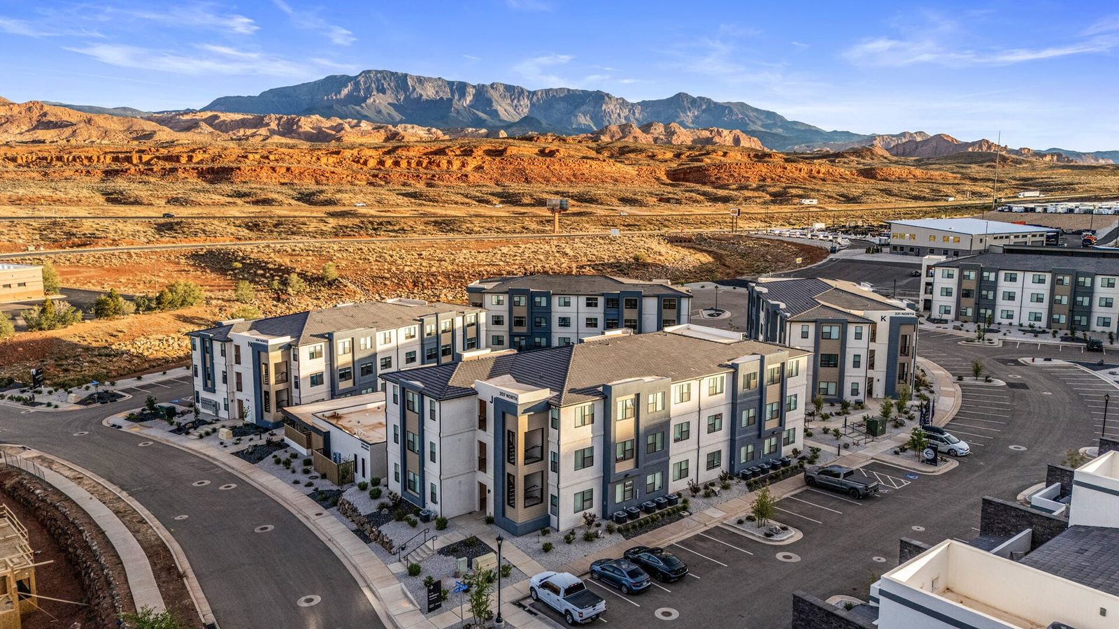 Aerial view of the Terra West condo buildings with red rock mountains