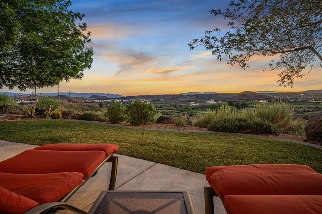 Golf course and red rock view from the patio loungers