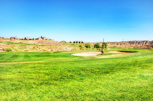 Coral Ridge area golf fairway with sand bunker