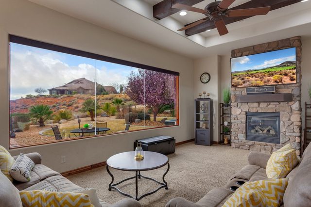 Living room picture window framing desert views at Coral Ridge 1919
