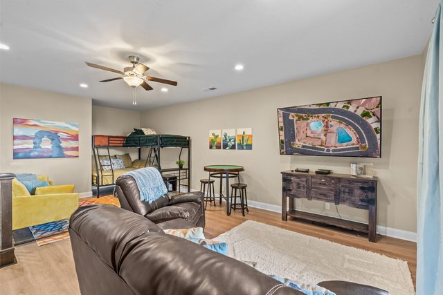 Loft with leather sofa, TV and twin over full bunk bed