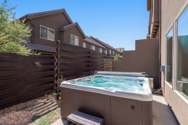 Private hot tub in the fenced side yard at Coral Ridge 2065
