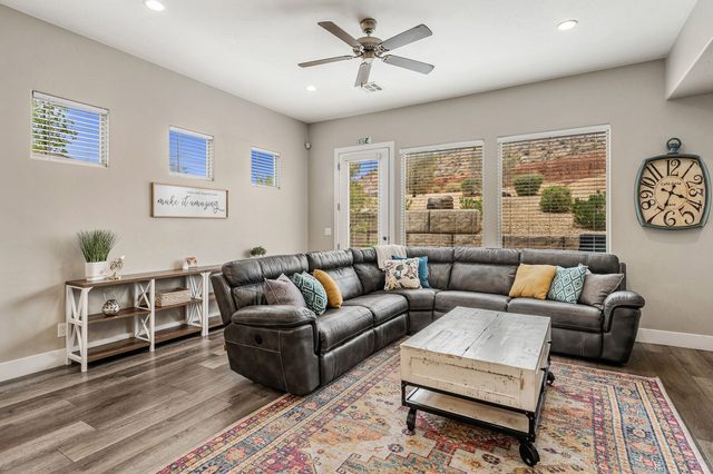Living room with recliner sectional and patio door