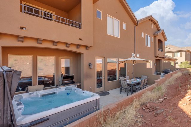 Private hot tub along the back of the townhome