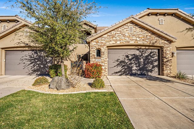Front exterior and garages of the Coral Ridge 4098 townhome