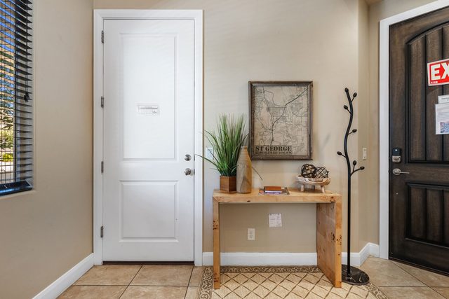 Entry foyer with console table and coat rack