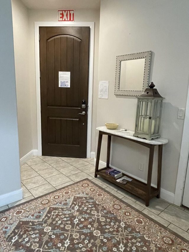 Front entry with console table and patterned rug