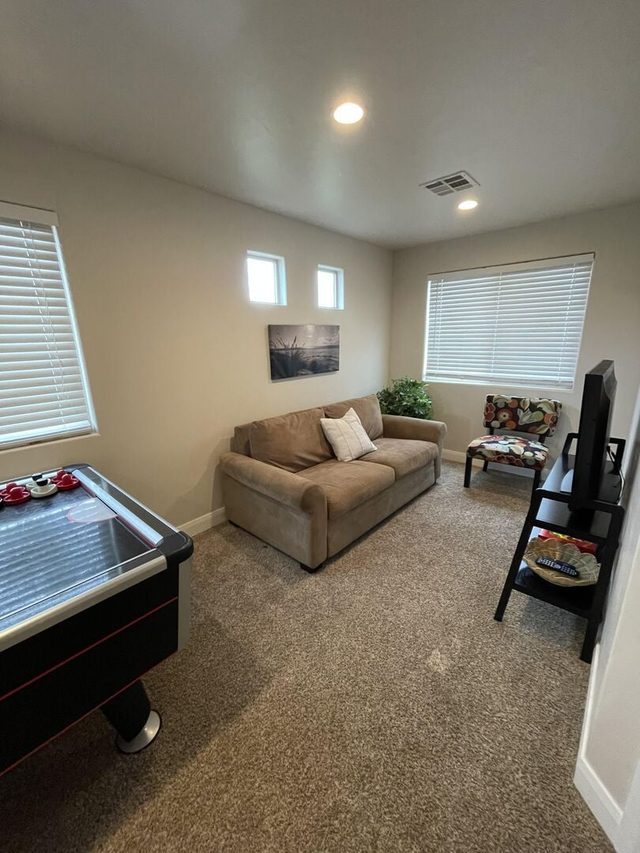 Loft with pull-out sofa bed, air hockey and TV