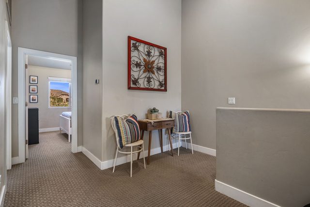 Upstairs loft with small table and chairs