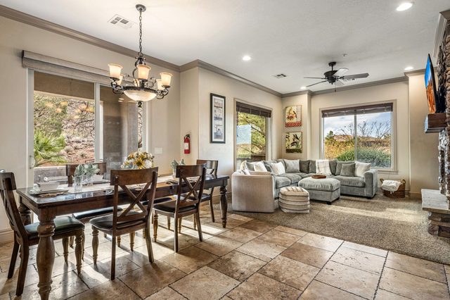 Dining table for six beside the living room sectional