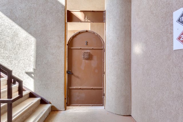 Unit entry door off the building stairwell