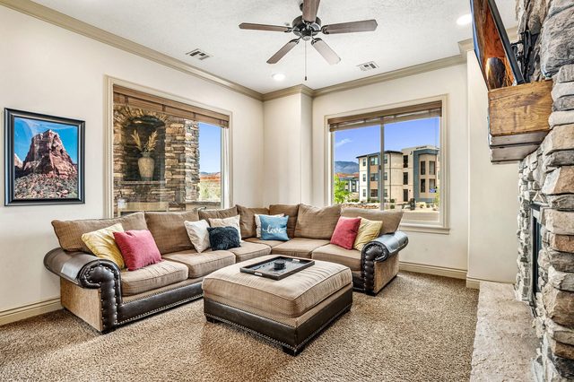 Sectional sofa and ottoman in the Coral Springs H2 living room