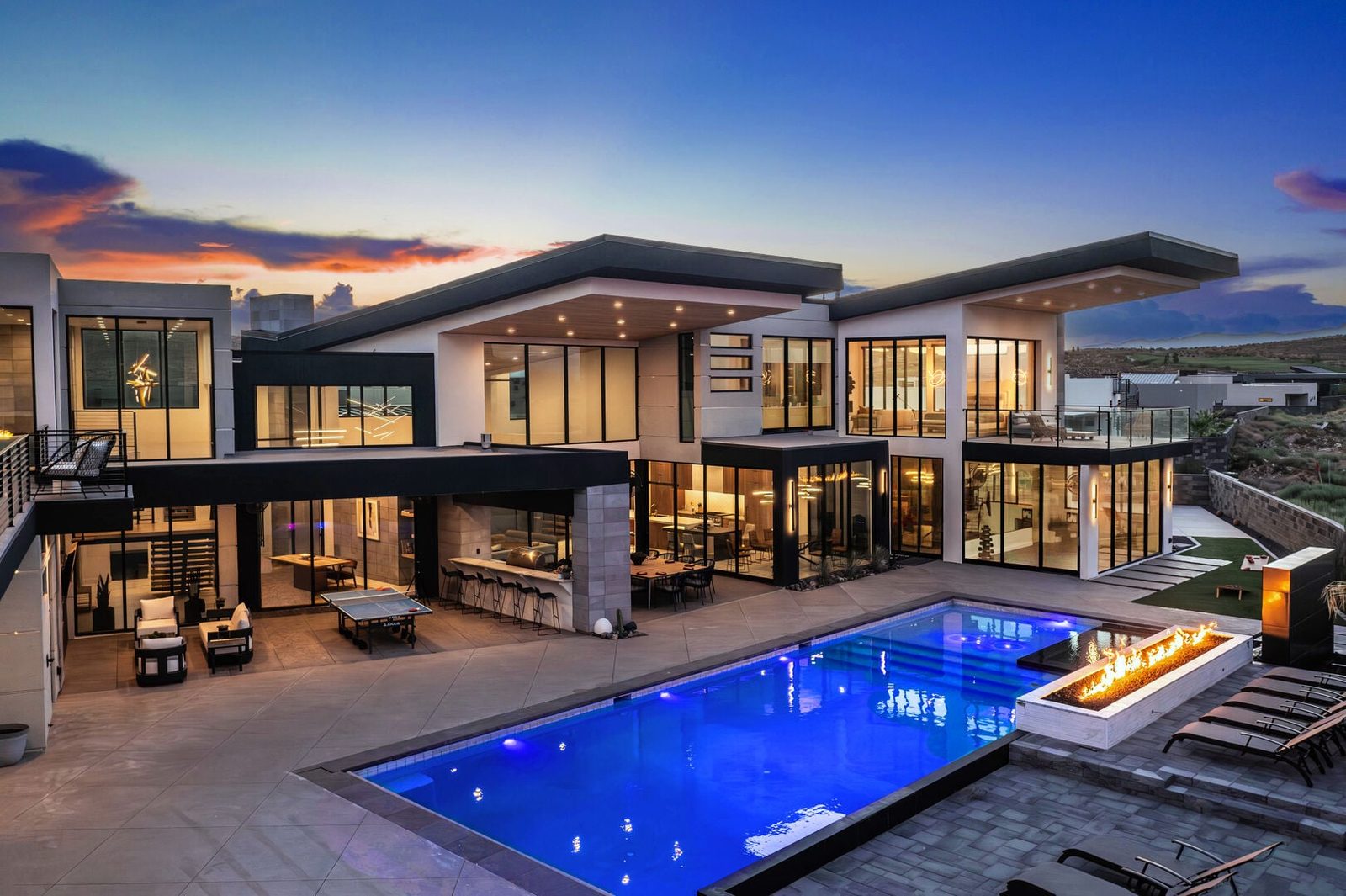 Twilight view of the private pool and fire feature at Eleanor at Copper Rock