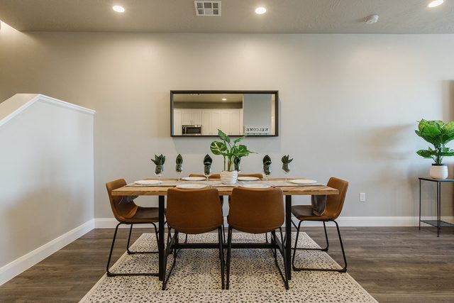Dining table for six with leather chairs