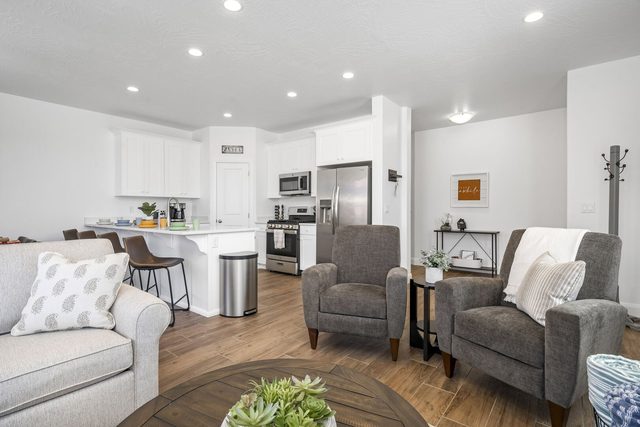 Open kitchen with stainless appliances seen from living room at Escondido 1145