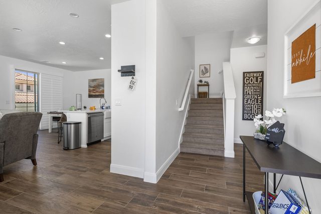 Entry hall and staircase with golf sign at Escondido 1145
