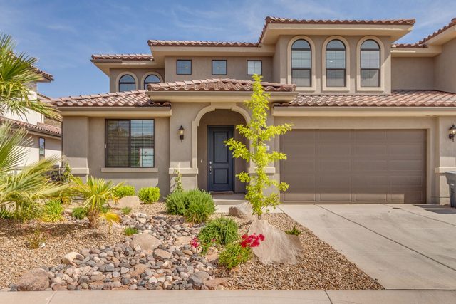 Front entry and desert landscaping at Escondido 2224