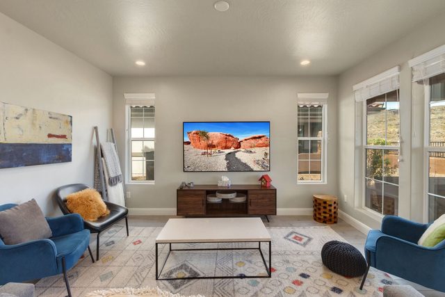 Great room seating area facing the TV console