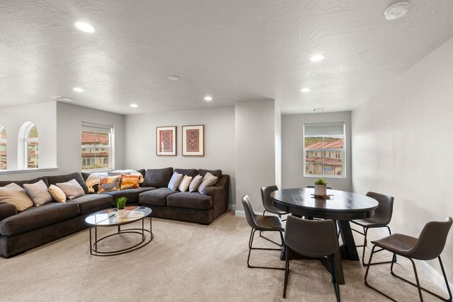 Loft lounge with sectional, coffee table and table seating
