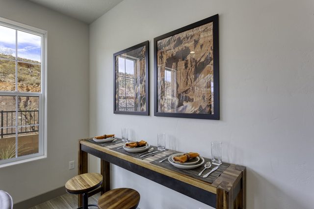 Bar-height counter with two stools for extra dining seating