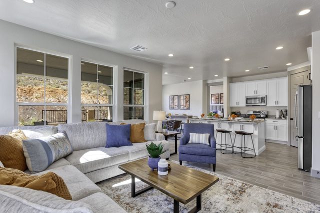 Great room sectional sofa facing the kitchen at Escondido 2323