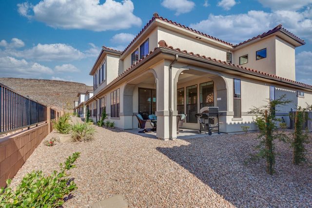 Back of Escondido 2361 with covered patio and grill