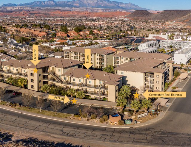 Aerial of the Estancia condo buildings with labeled pool entrance