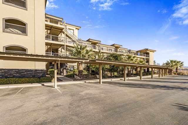 Covered parking beside the Estancia condo building
