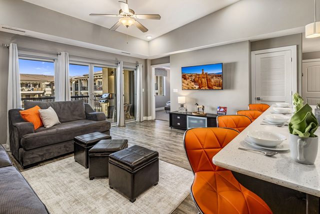 Living room seating next to the kitchen island