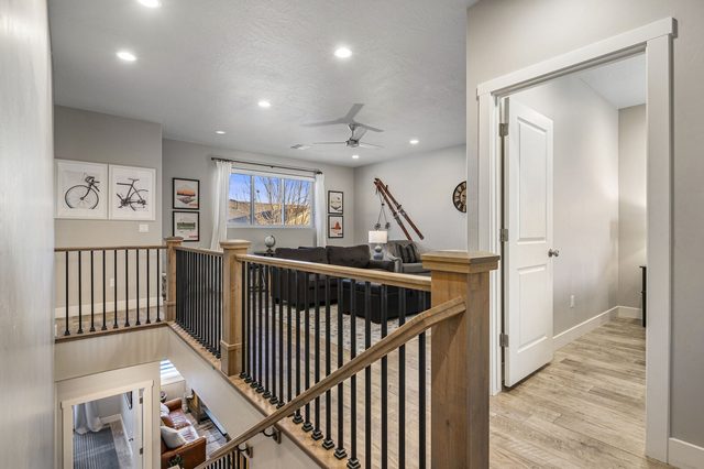 Upstairs landing overlooking the stairs toward the loft