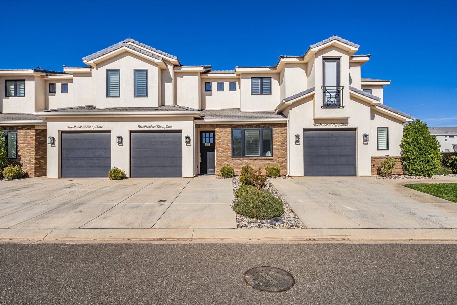 Front of Freedom Village 549 townhome with two-car garages