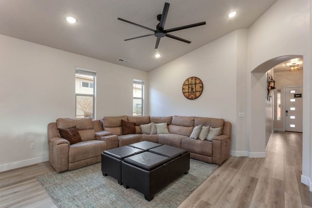 Sectional sofa and storage ottomans in living room at Ladera 415