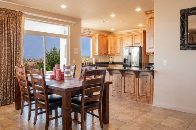 Dining table for a group next to the kitchen island