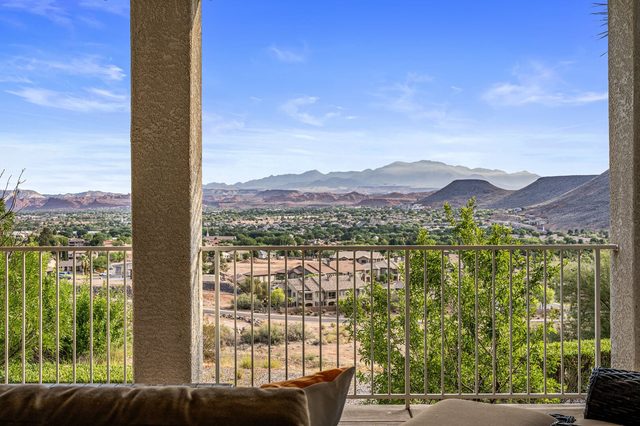 Balcony view of St. George valley and distant desert mountains
