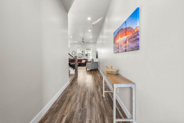Entry hallway with console table leading to living area