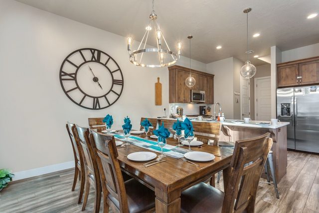 Dining table for eight beside the kitchen island