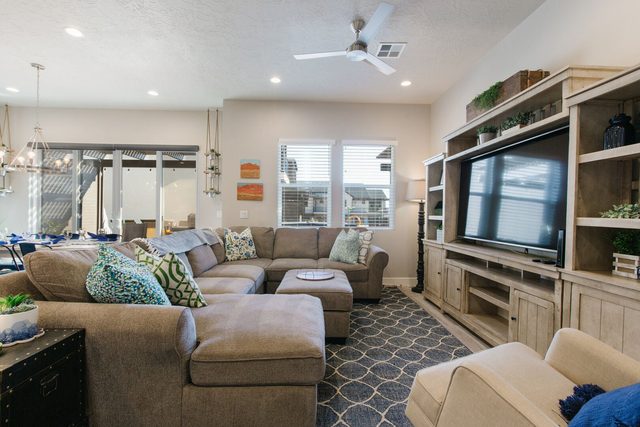 Open living room with large sectional sofa at Ocotillo Springs 2