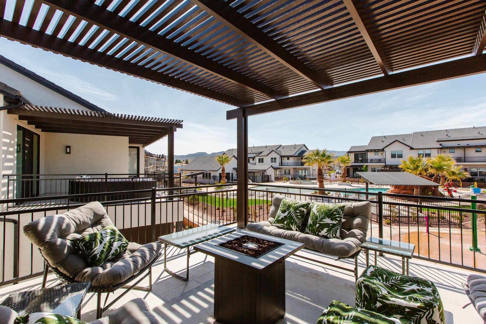Private balcony fire table overlooking the Ocotillo Springs community