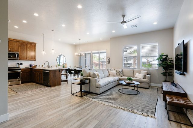 Great room linking living area, kitchen and dining at Ocotillo Springs 27