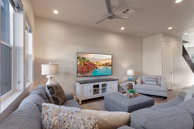 Large sectional sofa and TV in the main living room