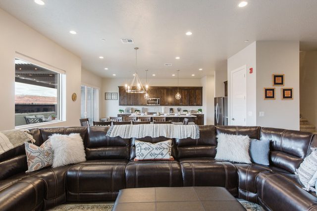 Great room with large leather sectional at Ocotillo Springs 32
