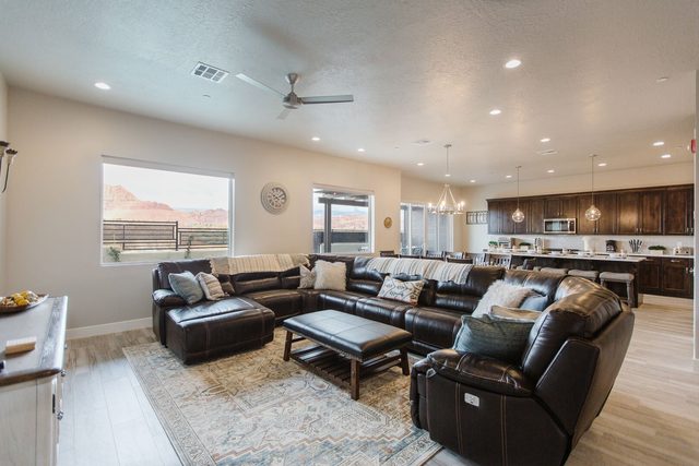 Great room seating with red rock window views at Ocotillo Springs 32