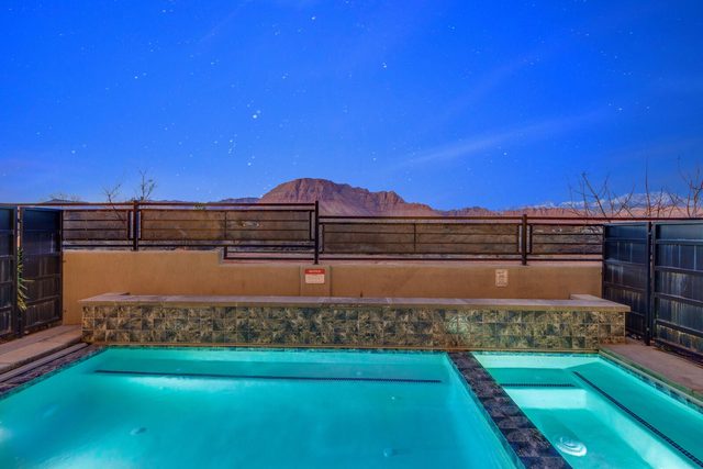 Private pool and raised spa at dusk at Ocotillo Springs 32
