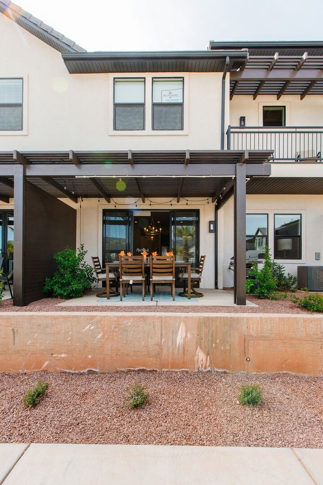 Rear of Ocotillo Springs 4 townhome with covered patio and balcony