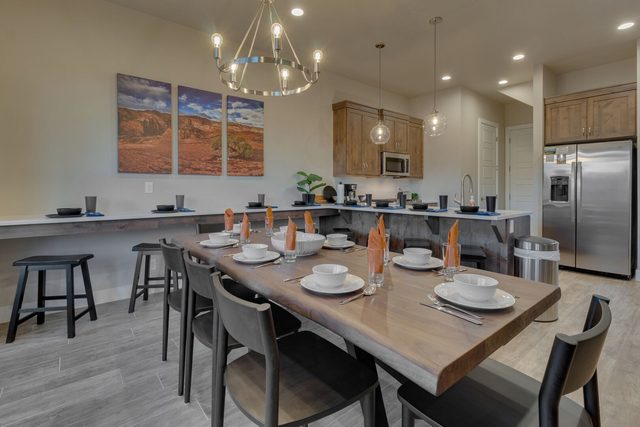 Long dining table with bar counter seating at Ocotillo Springs 42