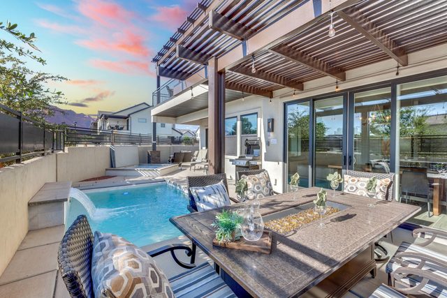 Private pool and patio dining at Ocotillo Springs 43 at sunset