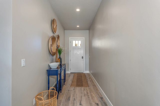 Entry hallway with console table leading to the front door